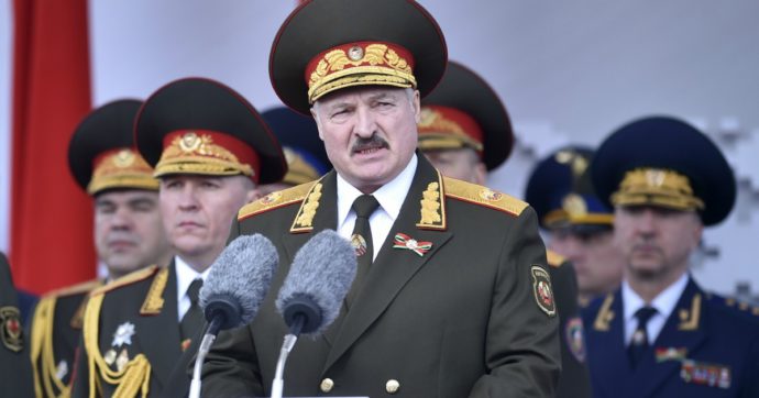 Belarusian President Alexander Lukashenko, center, gives a speech during a military parade that marked the 75th anniversary of the allied victory over Nazi Germany, in Minsk, Belarus, Saturday, May 9, 2020. (Sergei Gapon/Pool Photo via AP)